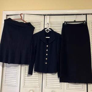 Black button down sweater jacket with two skirts. By St.John Size 4